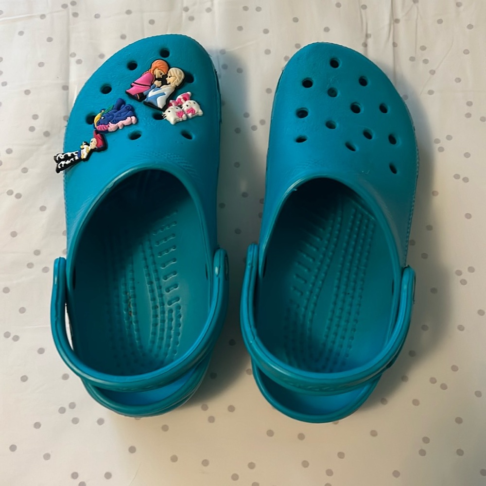 Crocs with a few charms